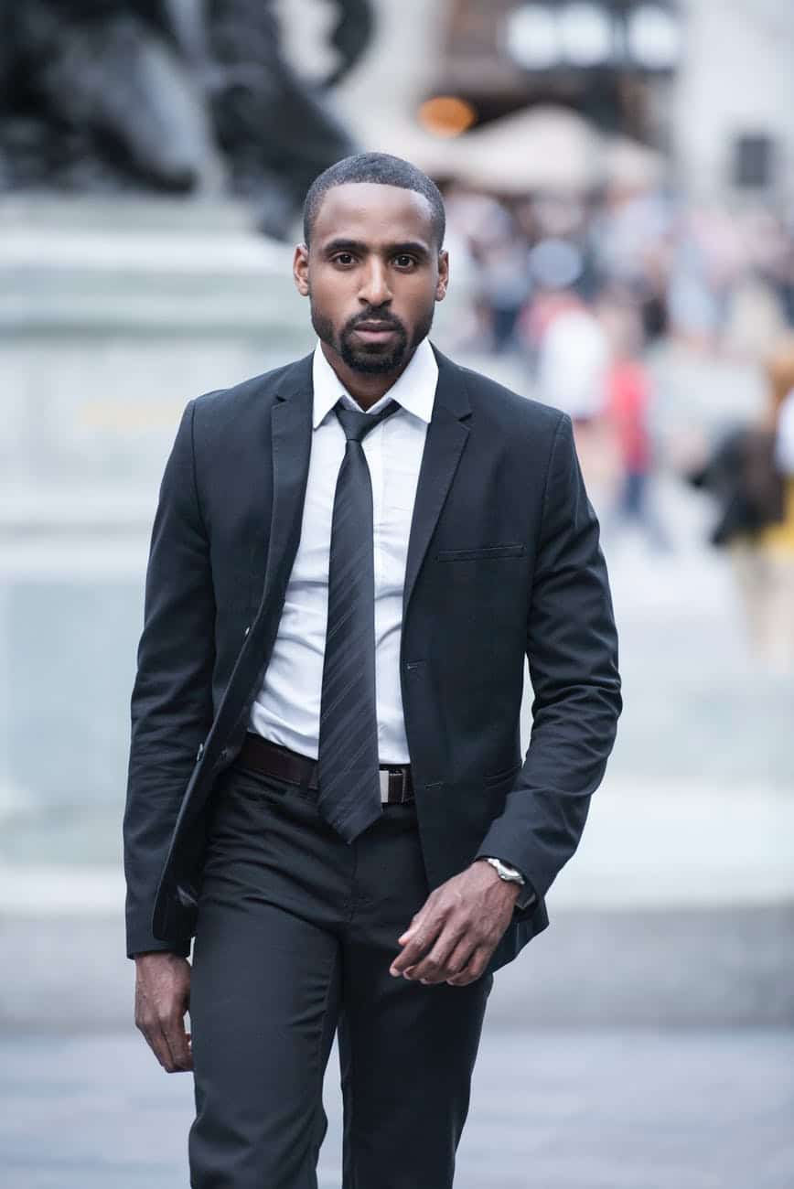 man wearing black suit